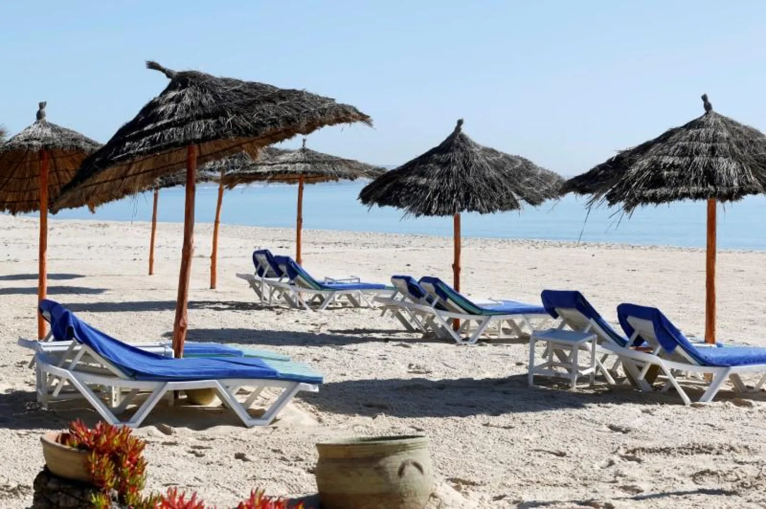 Empty sunbathing chairs are seen on a beach near the Hasdrubal Hotel in Hammamet, Tunisia, on March 12, 2020. REUTERS/Zoubeir Souissi