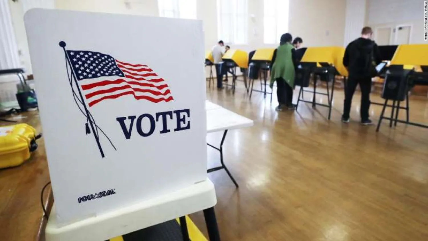 Voters prepare their ballots in voting booths during early voting for the California presidential primary election at an L.A. County 'vote center' on March 1, 2020 in Los Angeles, California. (Photo by Mario Tama/Getty Images)