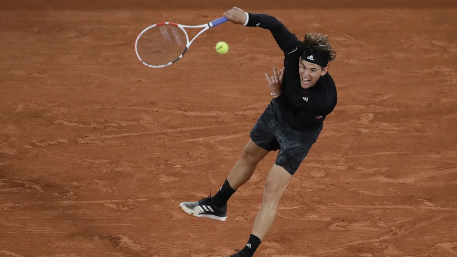 Austria's Dominic Thiem serves against Croatia's Marin Cilic in the first round match of the French Open tennis tournament. (AP)