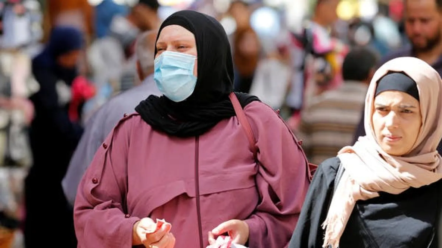 A Palestinian woman wearing a mask in Bethlehem in the West Bank. File photo: Reuters