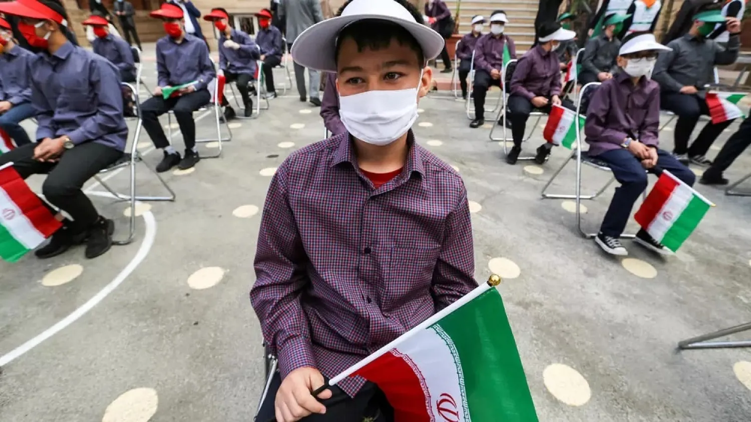 Children return to school amid the novel coronavirus outbreak in Iran. (AFP)