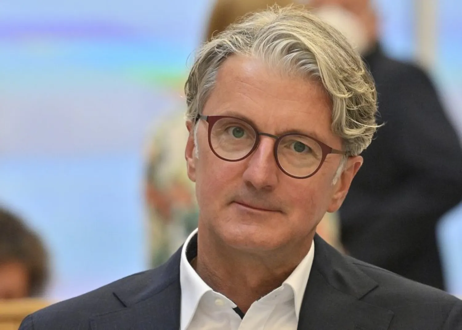 Rupert Stadler, the long-time head of Audi, who is accused of fraud, among other things, at the Munich Regional Court, Munich, Germany, Wednesday, Sept.30, 2020. Five years after the VW diesel scandal was uncovered, the first German criminal trial in this matter is now beginning. With the former Chairman of the Board of Management of Audi AG Stadler and the former member of the Board of Management of Porsche Hatz, two former leading Audi engineers are also accused. The trial is taking place under difficult conditions in a large hall at the Munich-Stadelheim prison on account of Corona. (Peter Kneffel/dpa via AP)