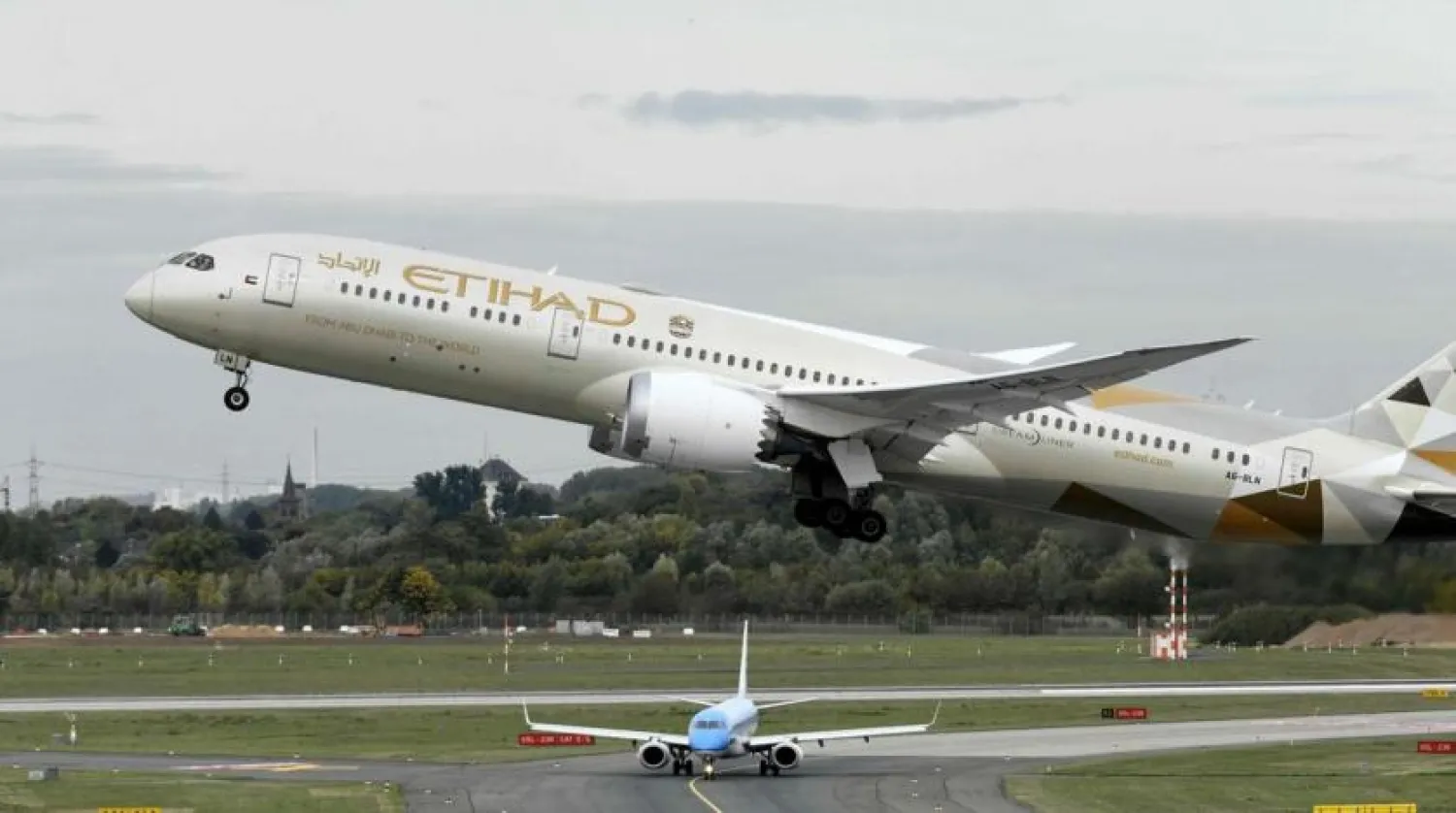 A Boeing 787-10 Dreamliner of Etihad airline takes off. (AFP)
