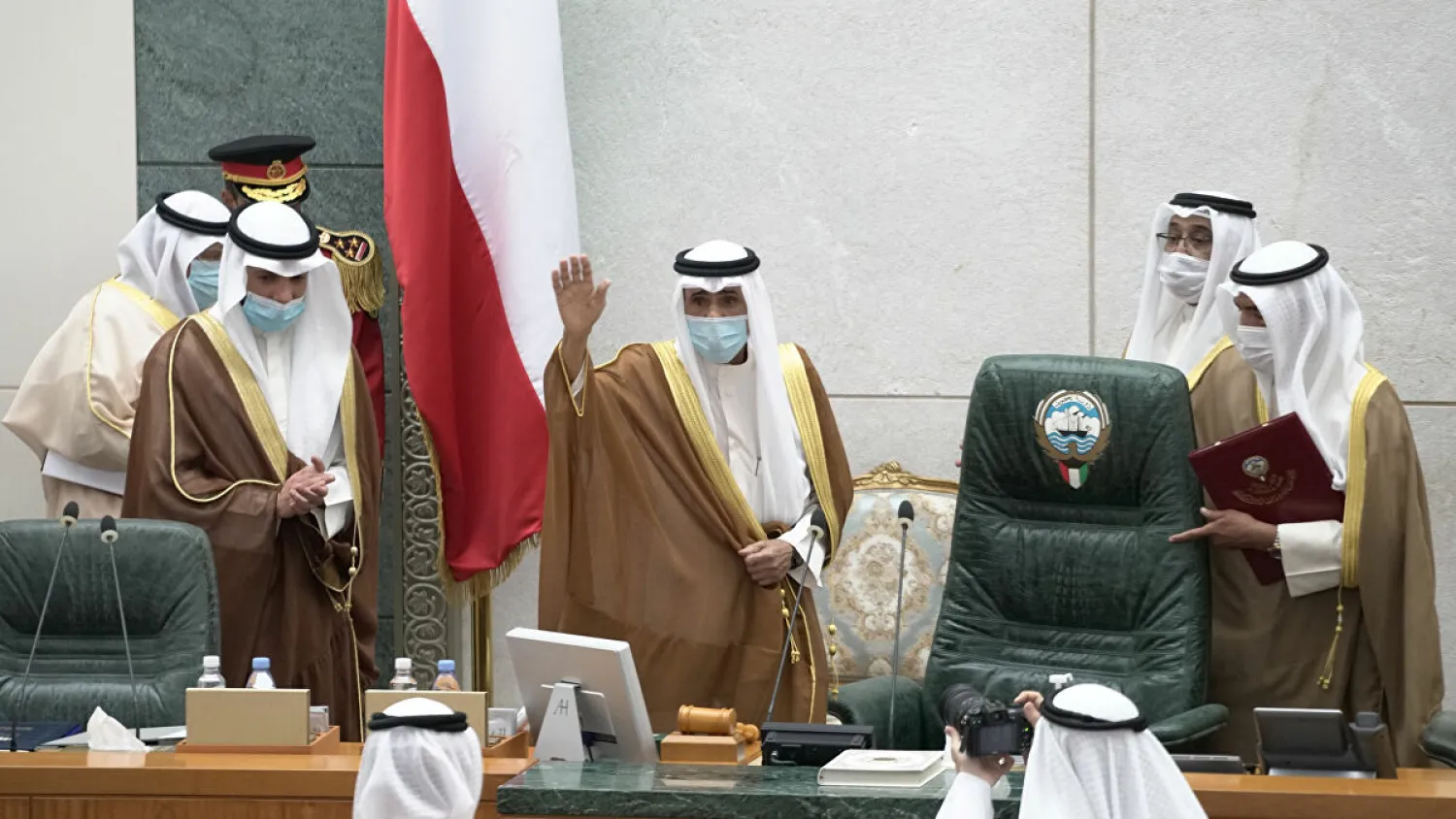 Kuwait's new Emir Nawaf al-Ahmad al-Sabah gestures as he takes the oath of office at the parliament, in Kuwait City, Kuwait September 30, 2020. REUTERS/Stephanie McGehee