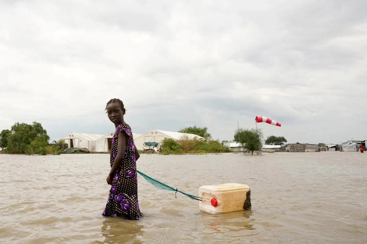 Record floods in Sudan have affected nearly one third of cultivated land and about 3 million people. (Reuters)