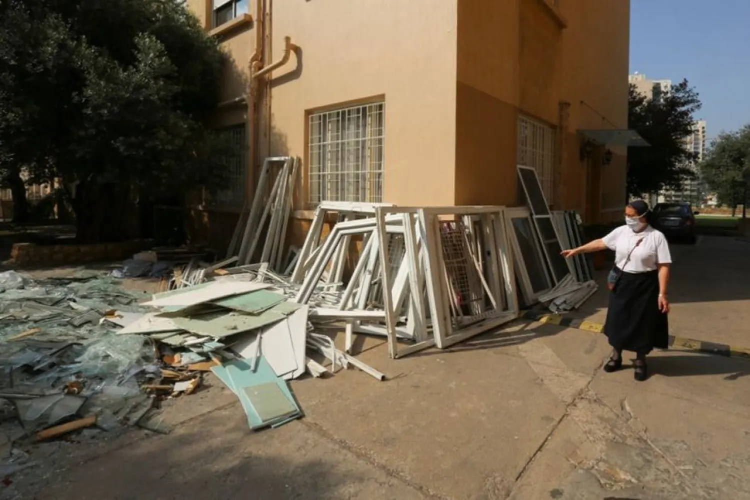 Sister Magida Fheili, Principal of College Notre Dame de Nazareth, shows the damage at the school due to the explosion at the port area, in Beirut, Lebanon September 18, 2020. REUTERS/Aziz Taher