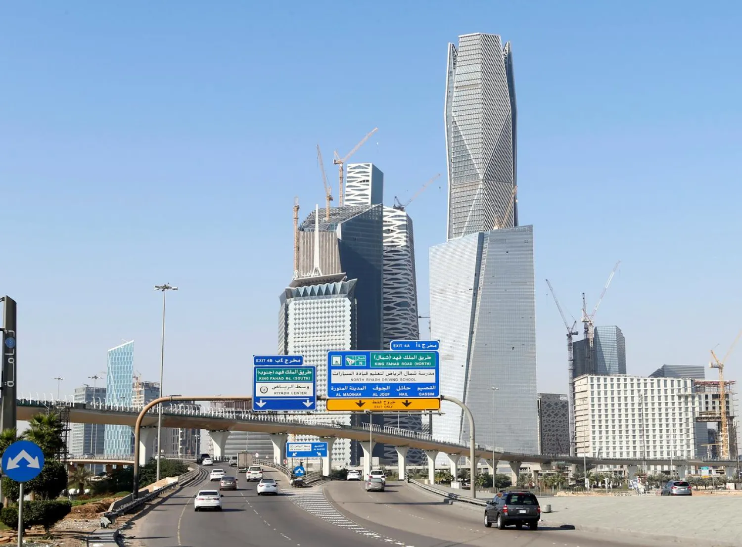 Cars drive past the King Abdullah Financial District in Riyadh, Saudi Arabia December 18, 2018. REUTERS/Faisal Al Nasser/File Photo