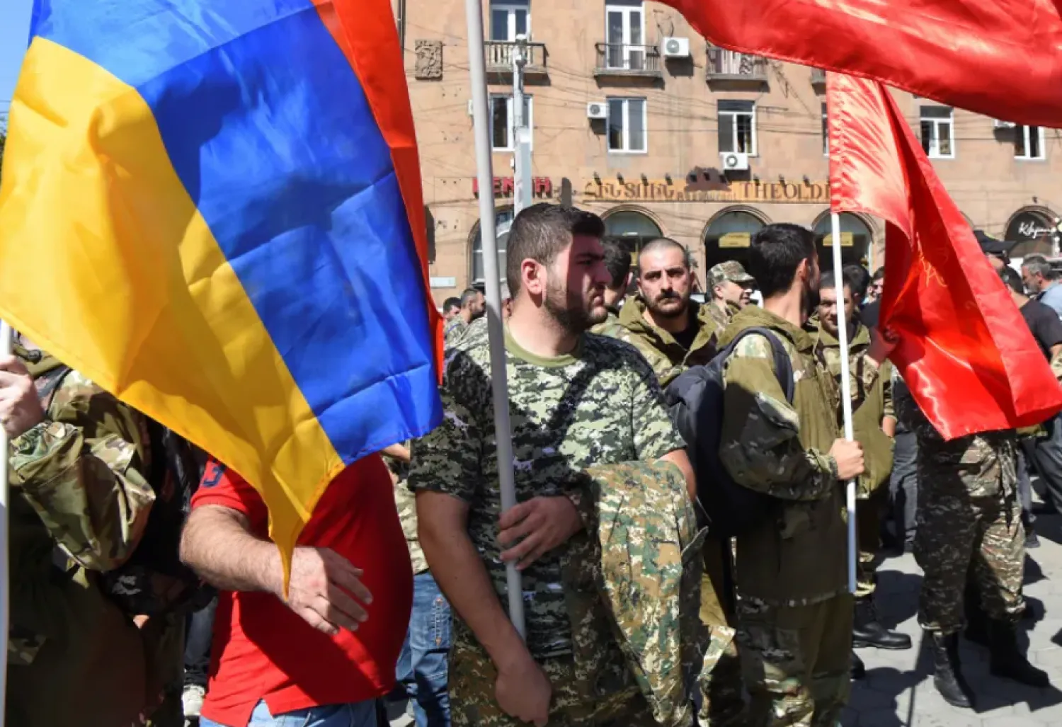 People attend a meeting to recruit military volunteers after Armenian authorities declared martial law and mobilized its male population following clashes with Azerbaijan over the breakaway Nagorno-Karabakh region in Yerevan, Armenia September 27, 2020. Melik Baghdasaryan/Photolure via REUTERS