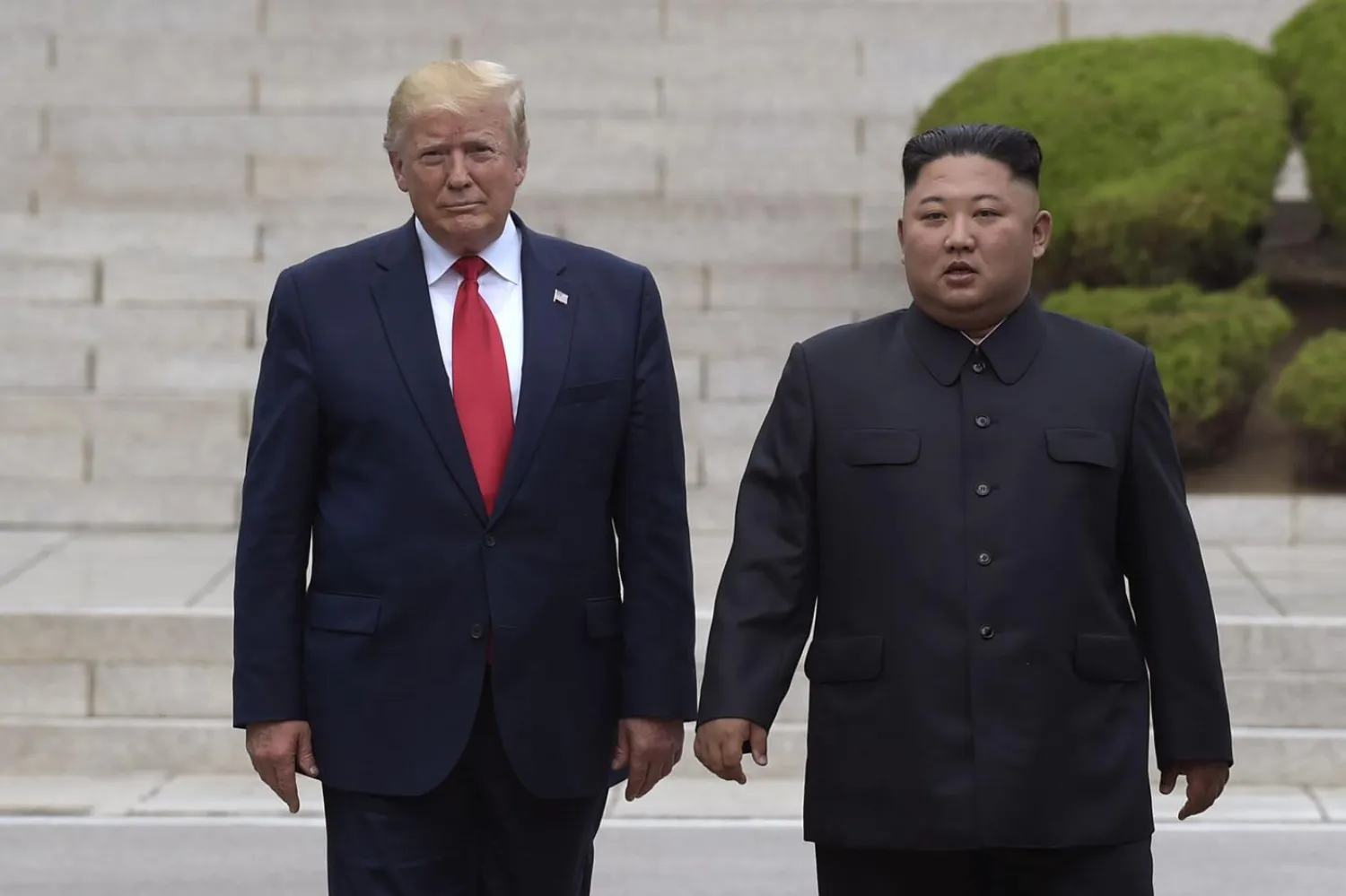 In this June 30, 2019, file photo, US President Donald Trump, left, meets with North Korean leader Kim Jong Un at the North Korean side of the border at the village of Panmunjom in Demilitarized Zone. (AP Photo/Susan Walsh, File)
