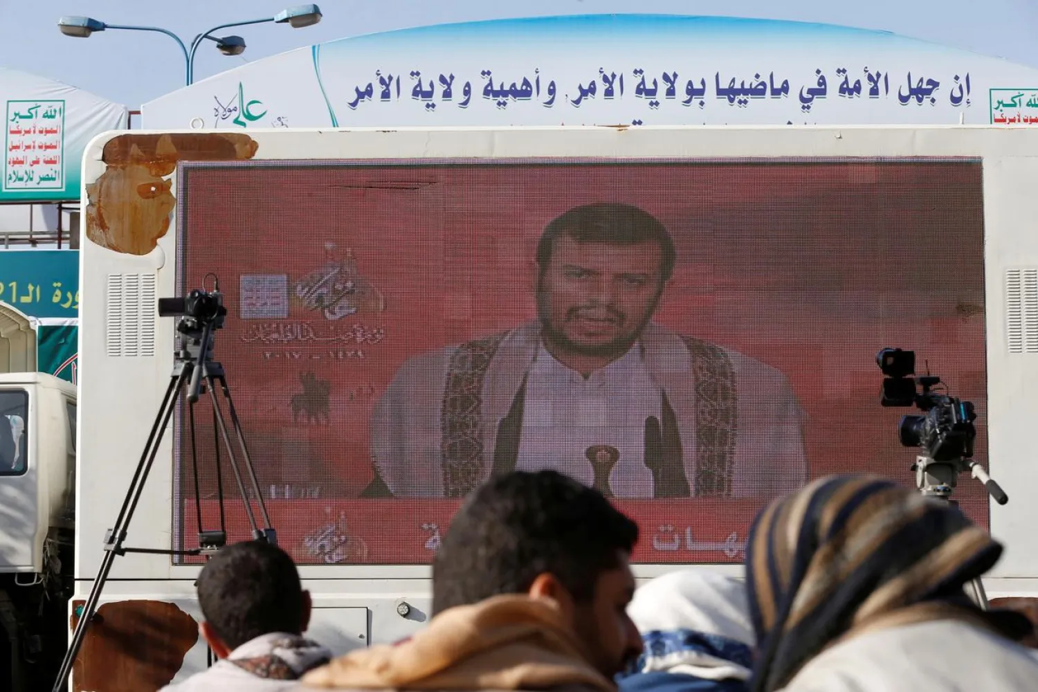 Leader of the Houthi movement, Abdul-Malik al-Houthi, addresses supporters via a screen in Sanaa, Yemen September 30, 2017. REUTERS/Khaled Abdulla
