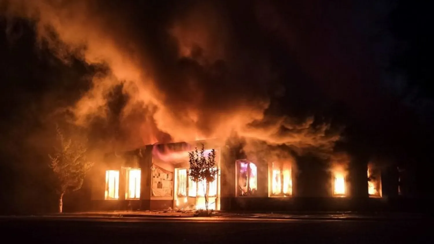 A shop is seen on fire following recent shelling during a military conflict over the breakaway region of Nagorno-Karabakh in Stepanakert October 3, 2020. (Reuters)