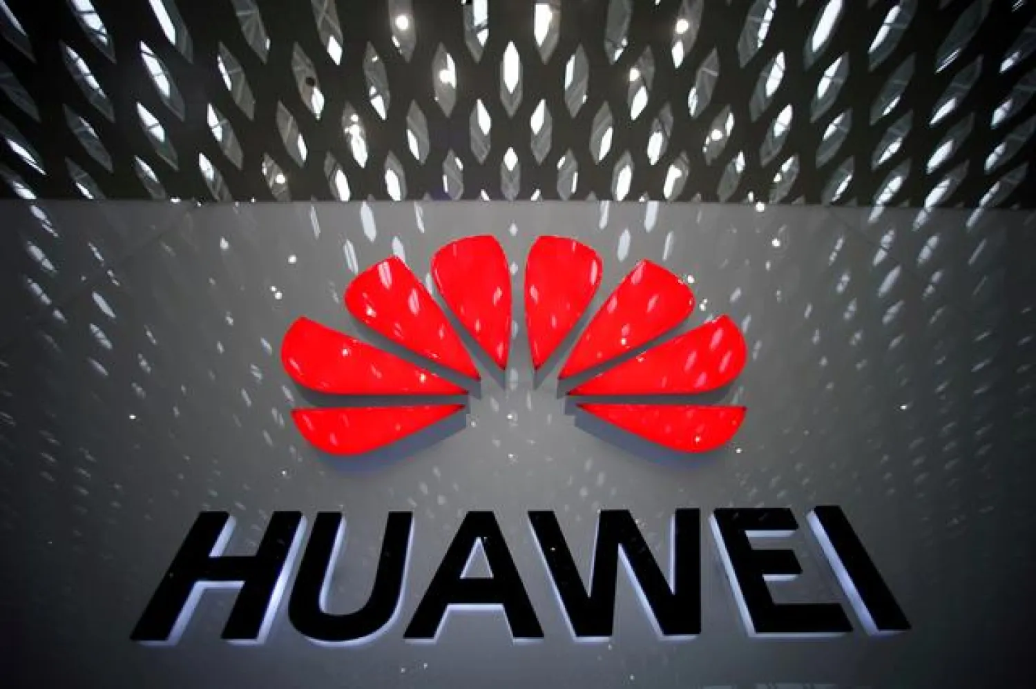 FILE PHOTO: A Huawei company logo is pictured at the Shenzhen International Airport in Shenzhen, Guangdong province, China, July 22, 2019. REUTERS/Aly Song/File Photo
