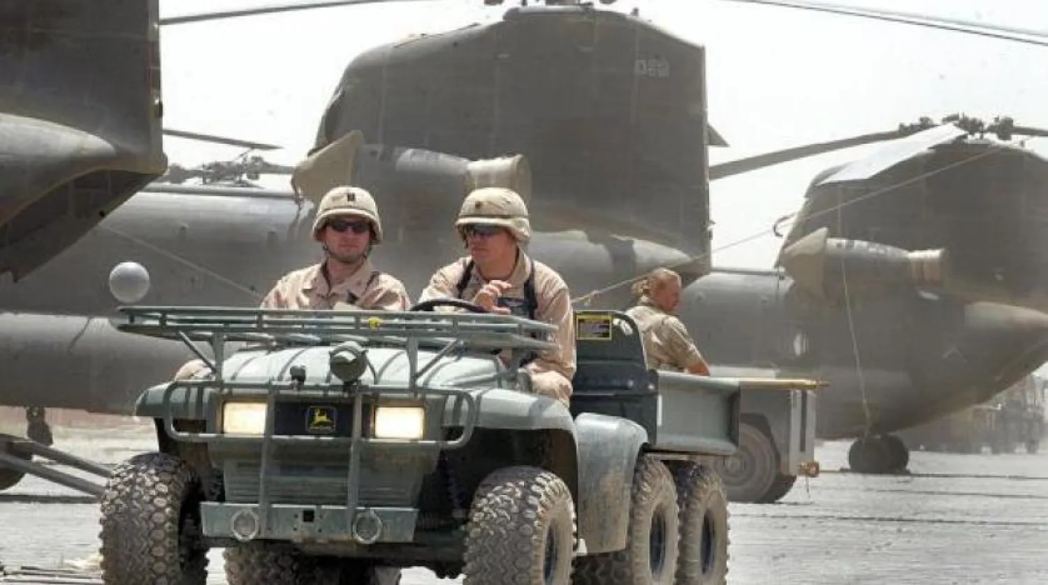 Afganistan'daki en büyük Amerikan askeri üslerinden biri olan Bagram Hava Üssü'ndeki Amerikan askerleri (Arşivler - AFP)
