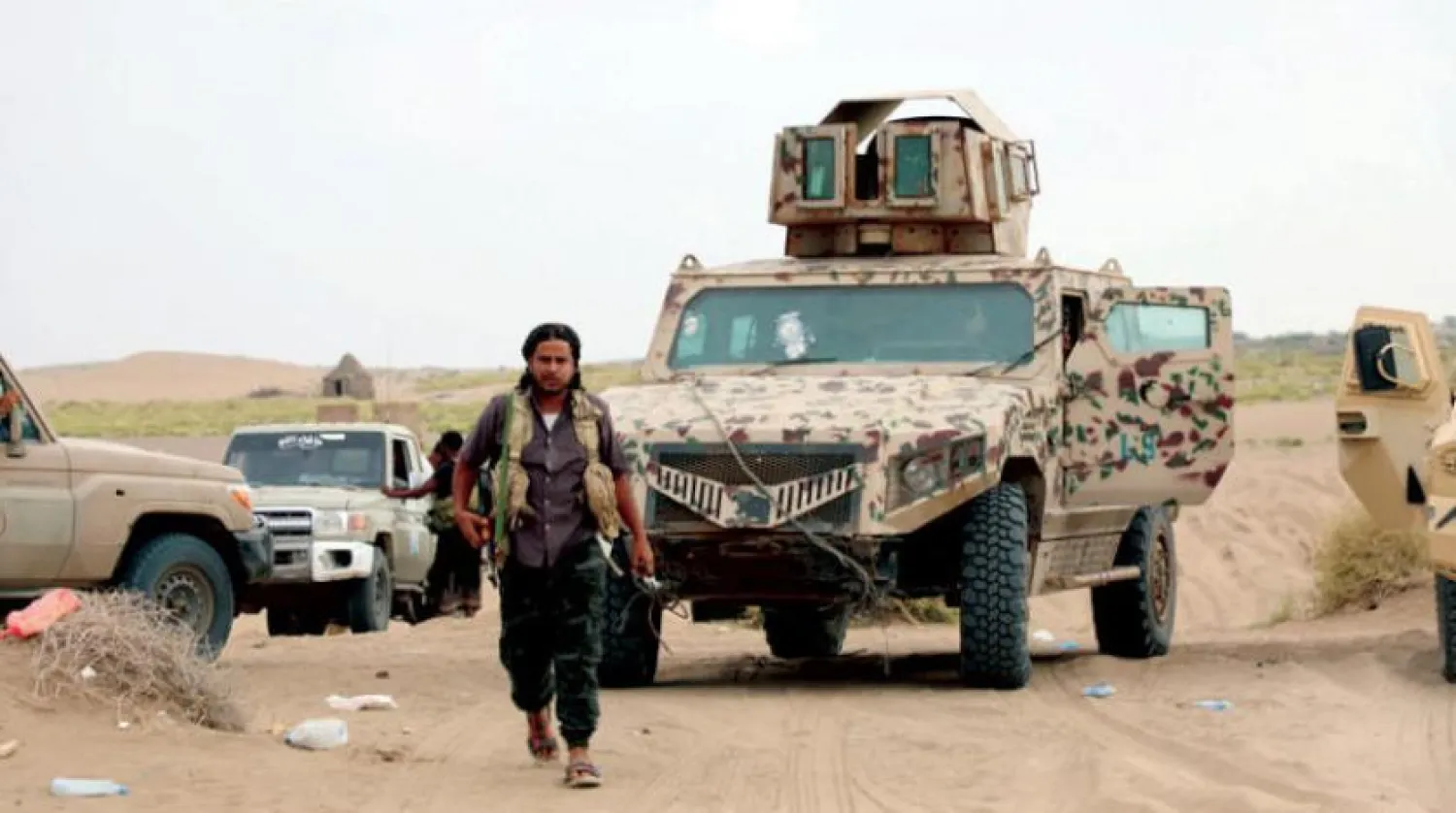 Hudeyde’de Husilerin saldırılarını geri püskürten Yemen hükümet güçleri. (EPA)