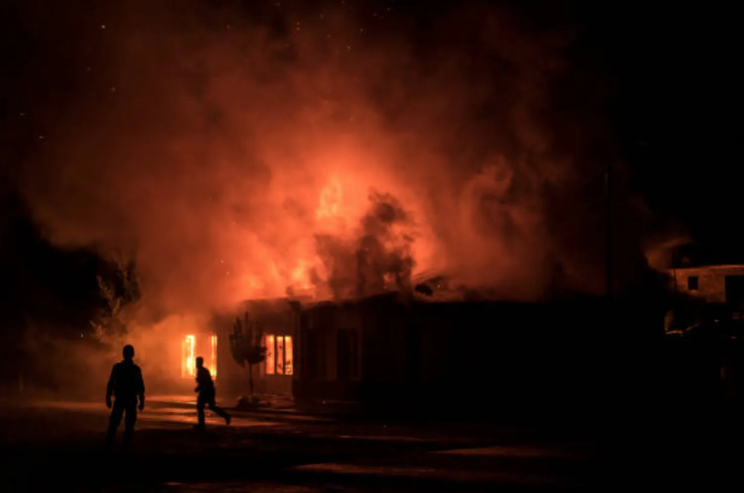 A fire burns in a hardware store after a rocket attack caused the building to catch fire on October 3, 2020 in Stepanakert, Nagorno-Karabakh. (Photo by Brendan Hoffman/Getty Images)