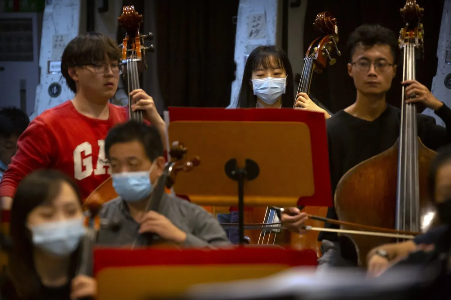 Musicians from the Wuhan Philharmonic Orchestra rehearse a day before their concert to open the Beijing Music Festival, in Beijing, Friday, Oct. 9, 2020. (AP)