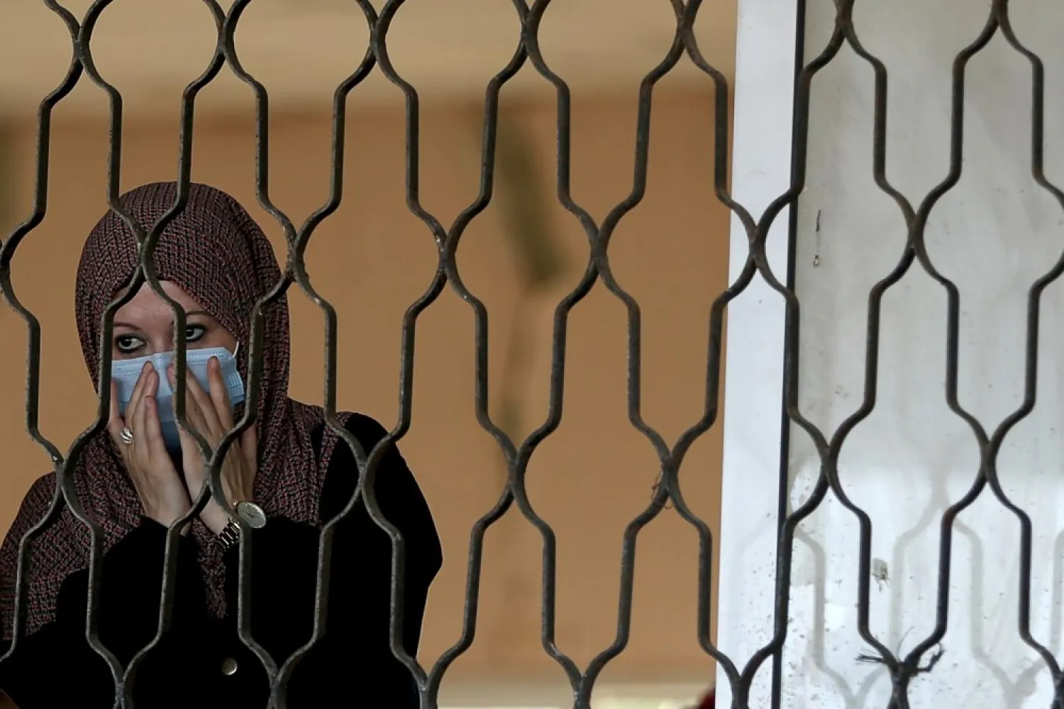 A Palestinian woman waits before leaving Rafah border crossing with Egypt in the southern Gaza strip. (Reuters file photo)