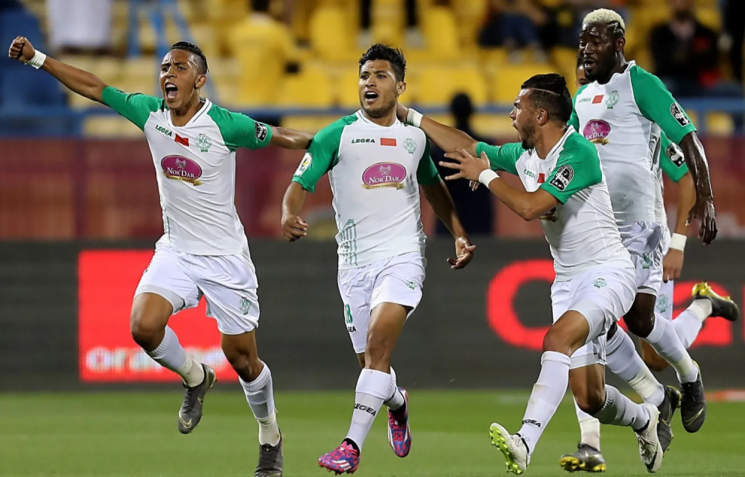Abdelilah Hafidi (2nd L) celebrates scoring for Raja Casablanca in the 2019 CAF Super Cup match against Esperance in Qatar. (AFP)