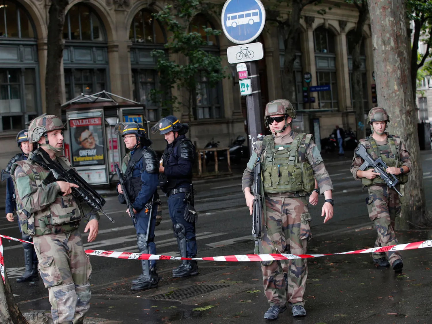 In this file photo from June 6, 2017, policemen and soldiers block access to Notre-Dame Cathedral after a man with a hammer attacked policemen who were patrolling the esplanade in front of the famous monument in Paris, France. © Christophe Ena, AP
