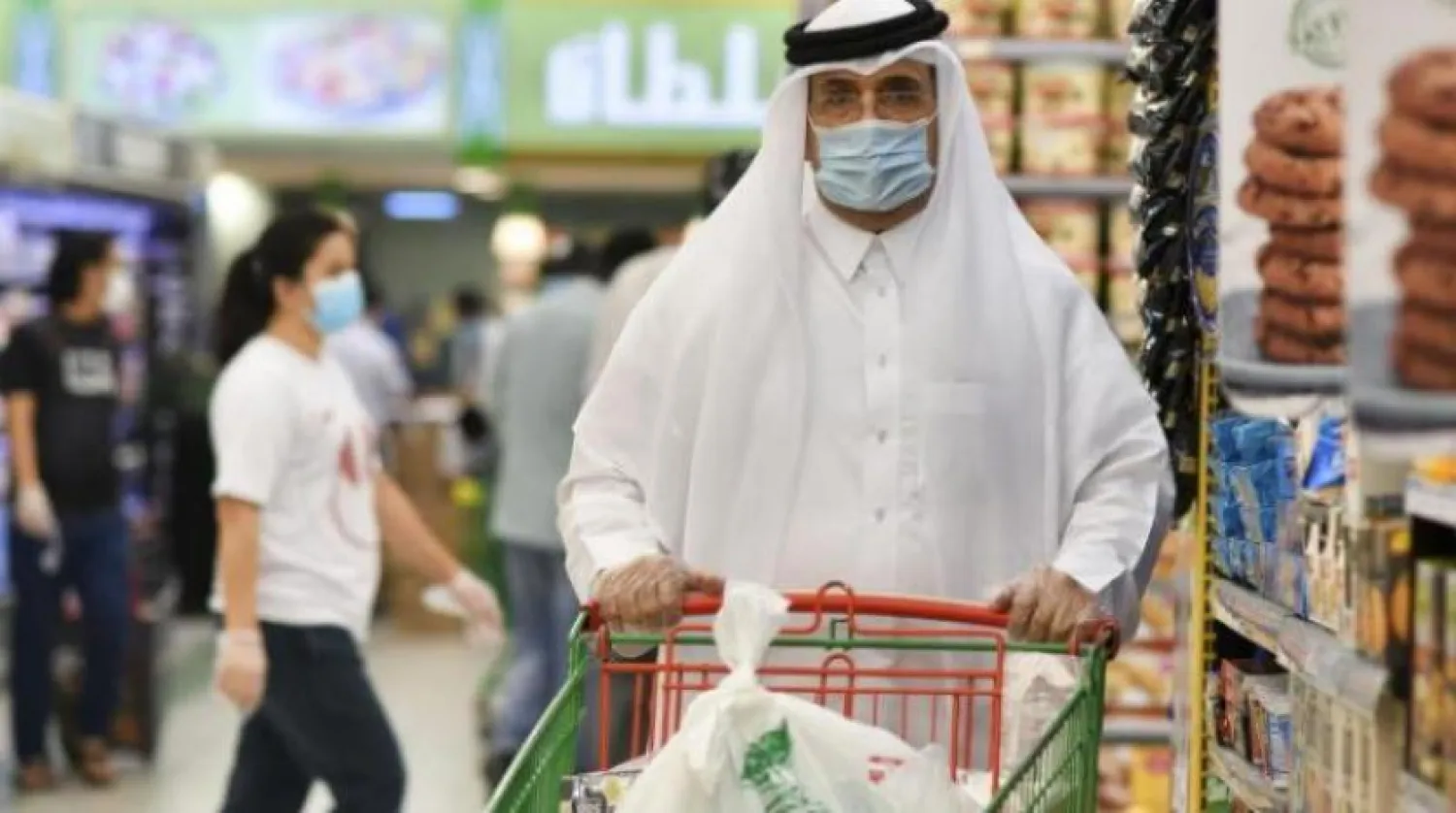 A Qatari man shops at a supermarket. EPA