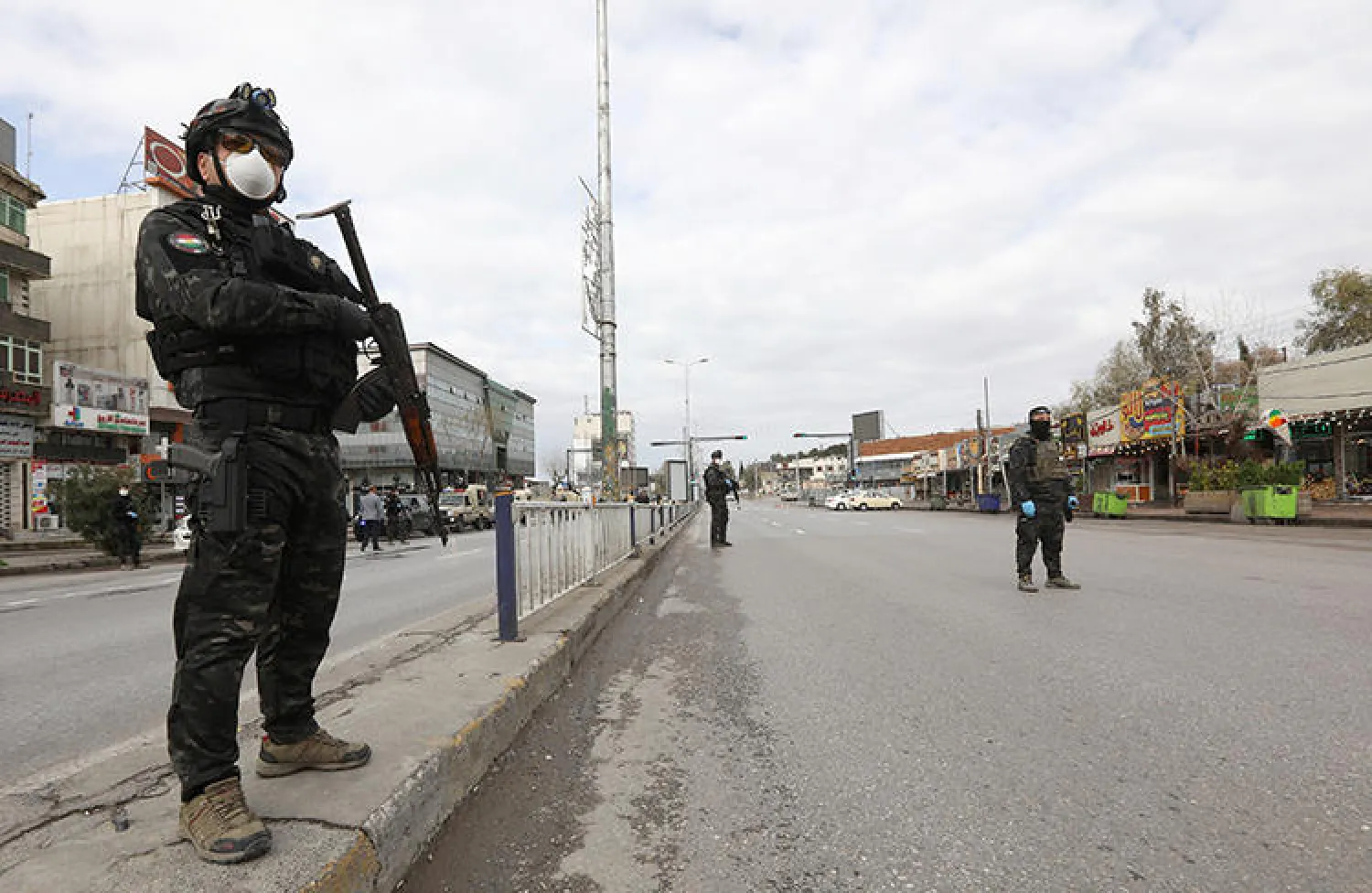 Security agents wearing masks in Sulaimaniya, Iraqi Kurdistan (Reuters)
