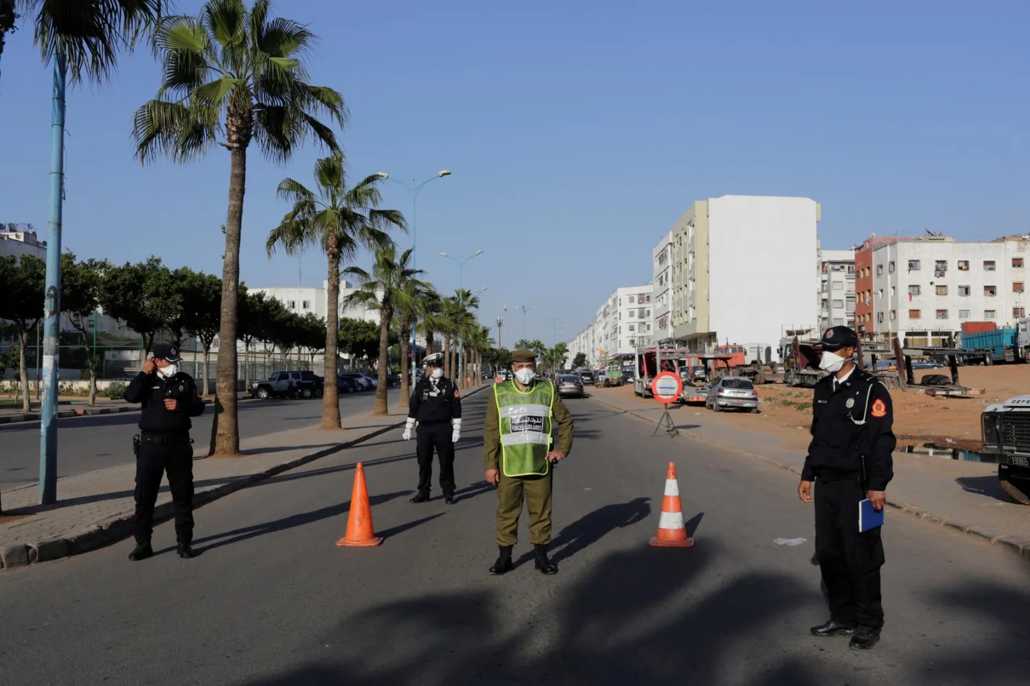 Police officers patrol streets, following the coronavirus disease (COVID-19) outbreak, on the outskirts of Casablanca, Morocco March 25, 2020. REUTERS/Youssef Boudlal/Files
