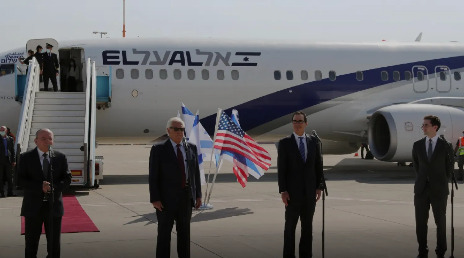 Israeli National Security Adviser Meir Ben-Shabbat, US Ambassador to Israel David Friedman, US Treasury Secretary Steve Mnuchin, and US Middle East envoy Avi Berkowitz, deliver statements before boarding Israeli flag carrier El Al plane to Bahrain, at Ben Gurion International Airport in Lod, near Tel Aviv, Israel October 18, 2020. REUTERS/Ronen Zvulun/Pool