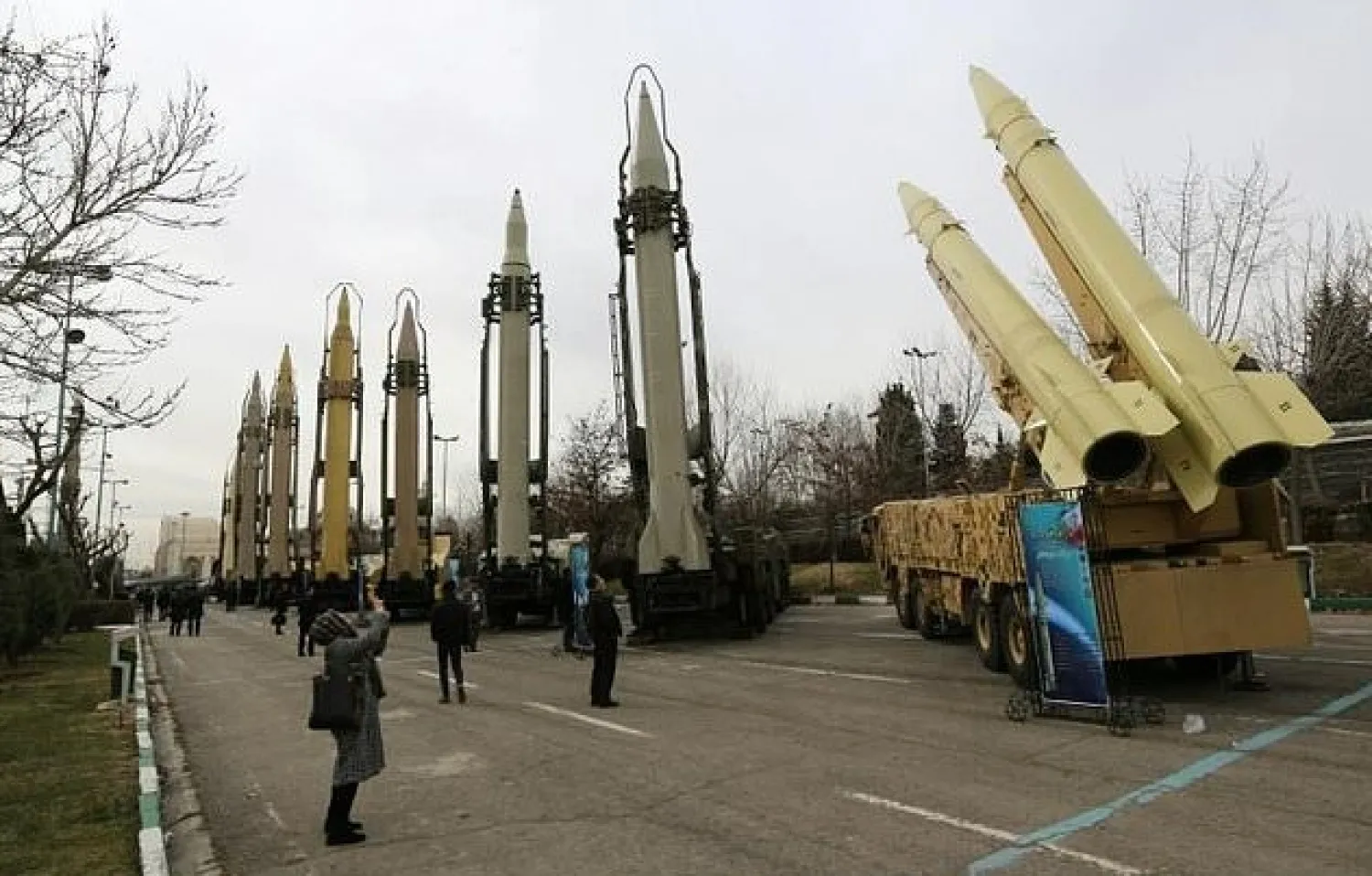 A file photo taken on February 2, 2019, shows Iranians visiting a weaponry and military equipment exhibition in the capital Tehran. AFP