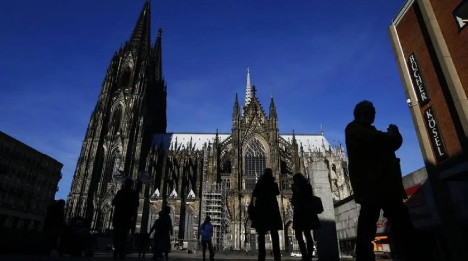 Almanya'nın batısındaki Köln şehrinde yaşayan vatandaşlar (Arşiv-Reuters)