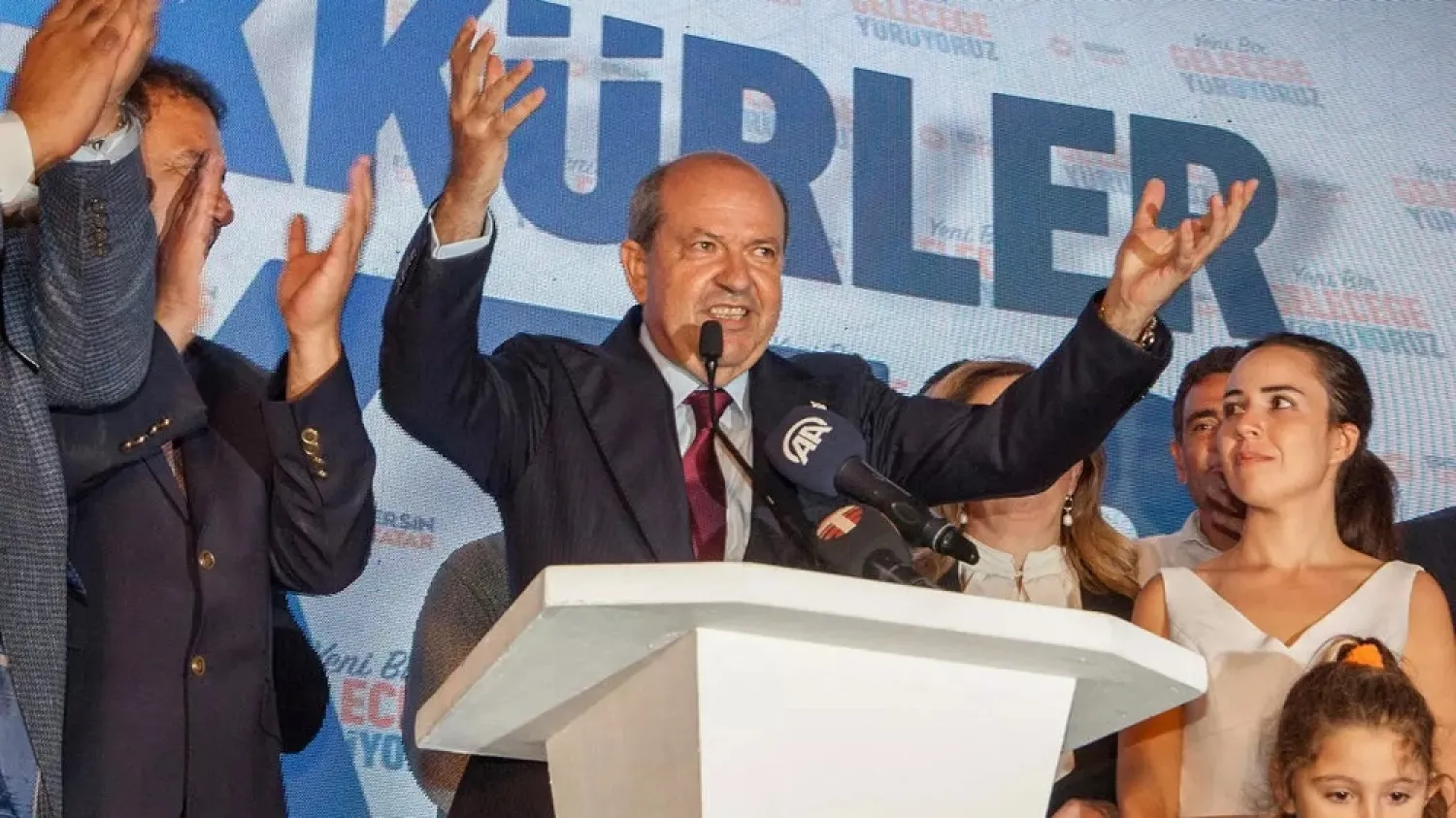 Newly-elected Turkish Cypriot president Ersin Tatar celebrates after winning to vote Sunday. (AFP)