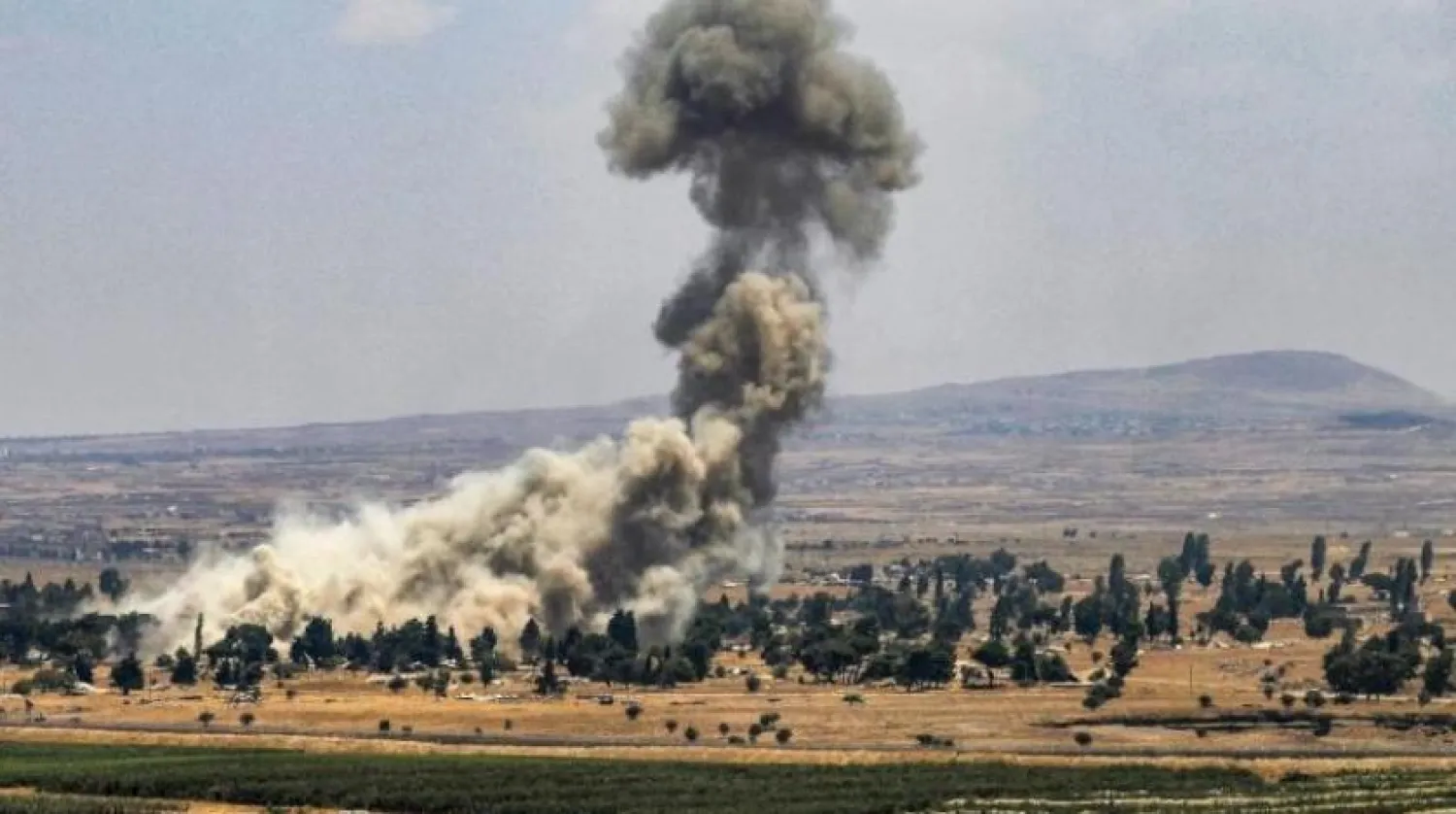 Smoke rises after an Israeli airstrike in Syria's Quneitra. AFP file photo