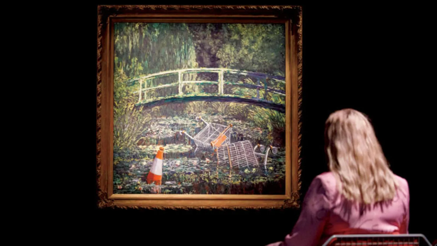 لوحة بانكسي «شو مي ذي مونيه» (أ.ف.ب)