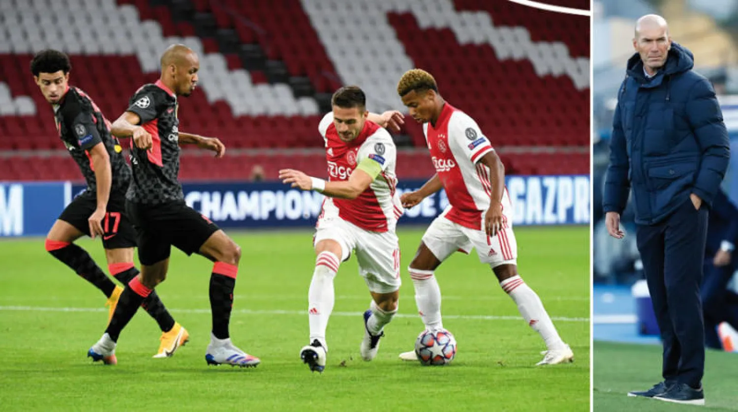 زيدان منزعج من افتقار ريال مدريد للثقة (رويترز)  -  فابينيو في مواجهة هجوم آياكس (رويترز)