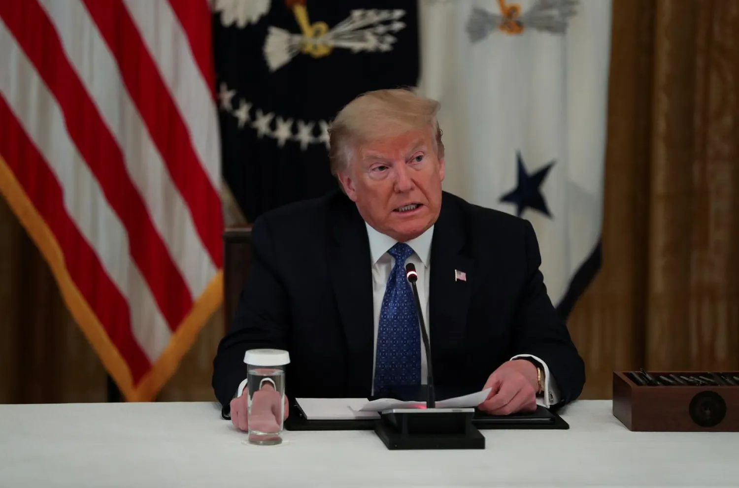 US President Donald Trump speaks about the coronavirus disease (COVID-19) pandemic response during a Cabinet meeting in the East Room at the White House in Washington, U.S., May 19, 2020. REUTERS/Leah Millis