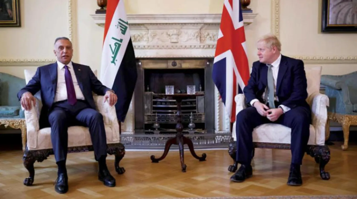 Kazimi ve Johnson dün Londra’da bir araya geldiler. (AFP)