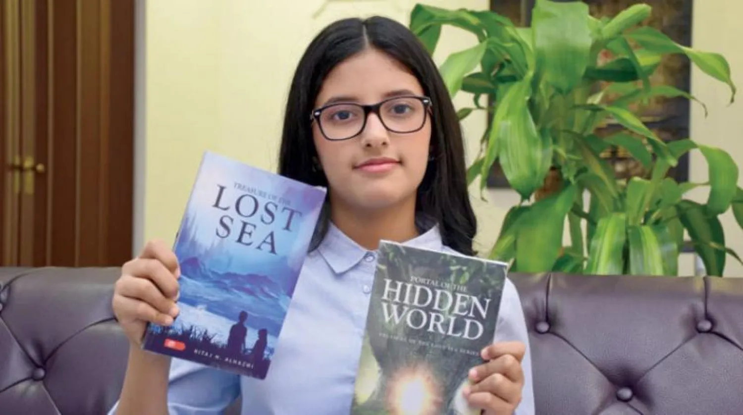 Ritaj Holding her published novels