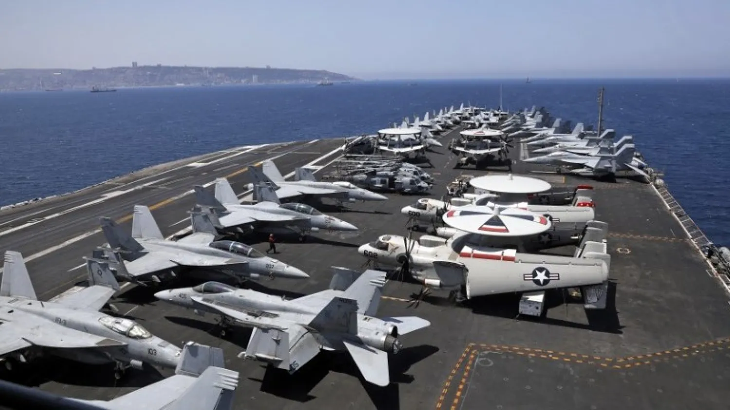 A general view of the deck of the US aircraft carrier USS George H. W. Bush, as it docks outside Haifa port, on July 3, 2017. (AFP Photo/AFP Photo and Pool/Ronen Zvulun)