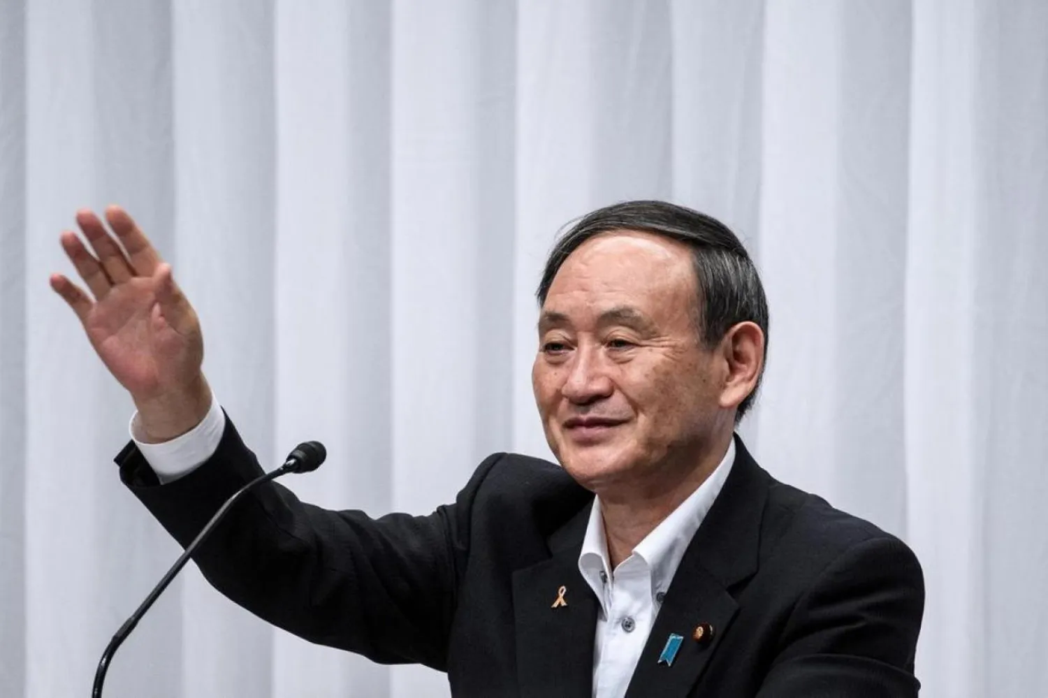 Suga koltuğu Shinzo Abe'de devralmıştı (Reuters)