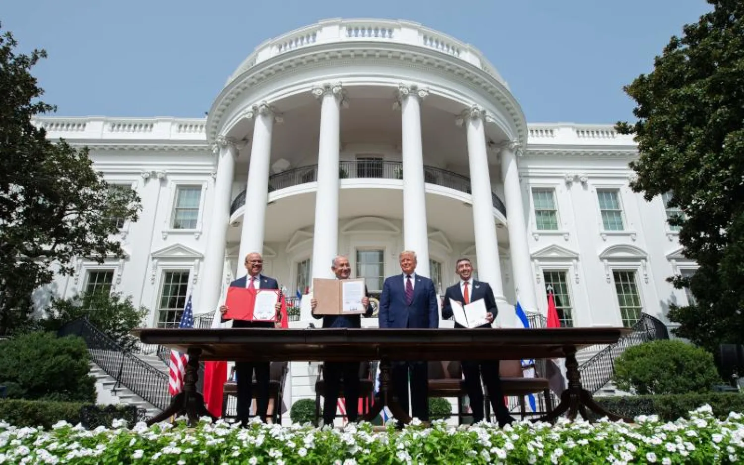 توقيع اتفاق السلام بين إسرائيل والإمارات والبحرين في البيت الأبيض (أ.ف.ب)