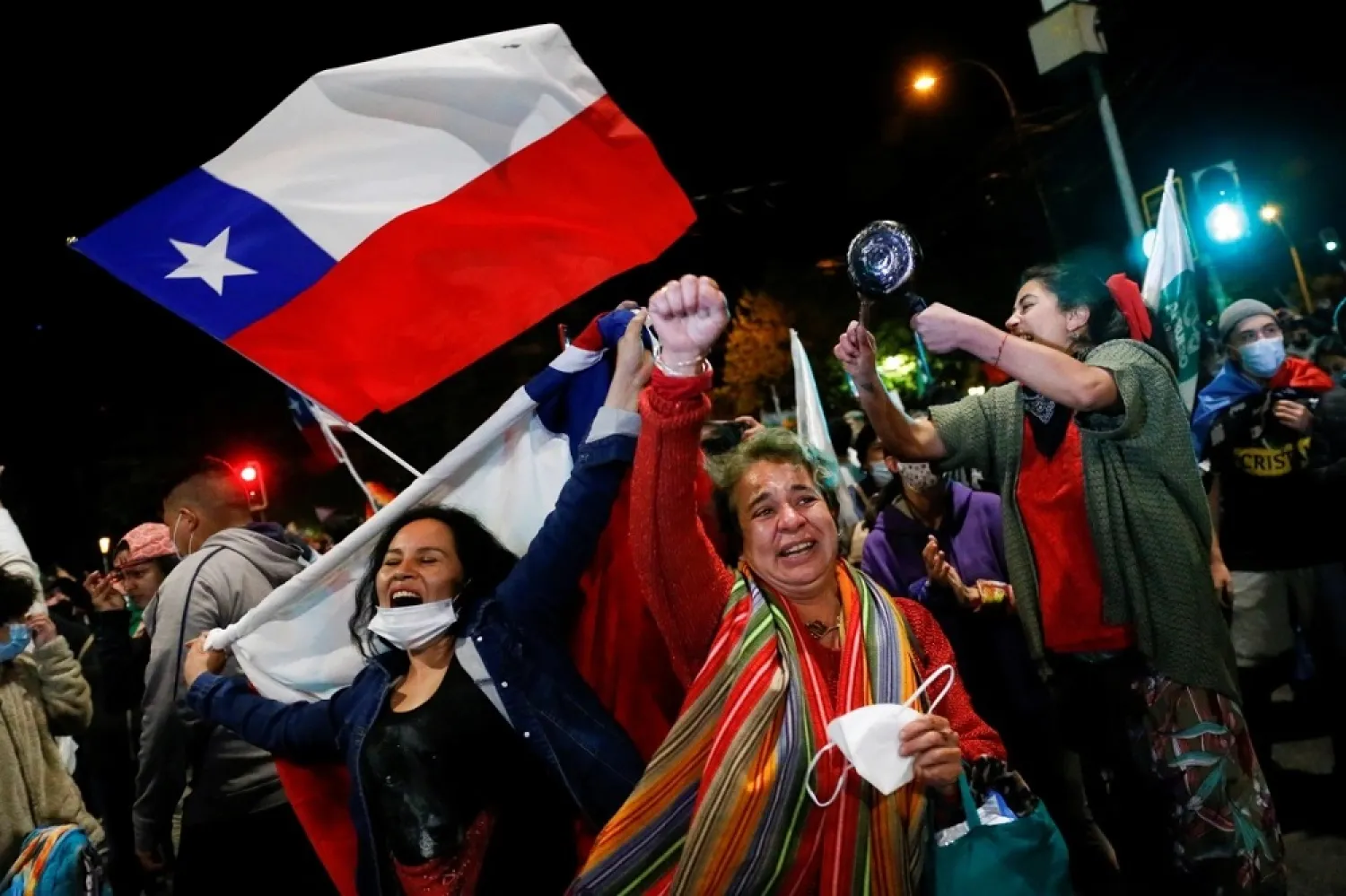 People poured into the streets and plazas of cities throughout Chile in celebration after the referendum. (Reuters)