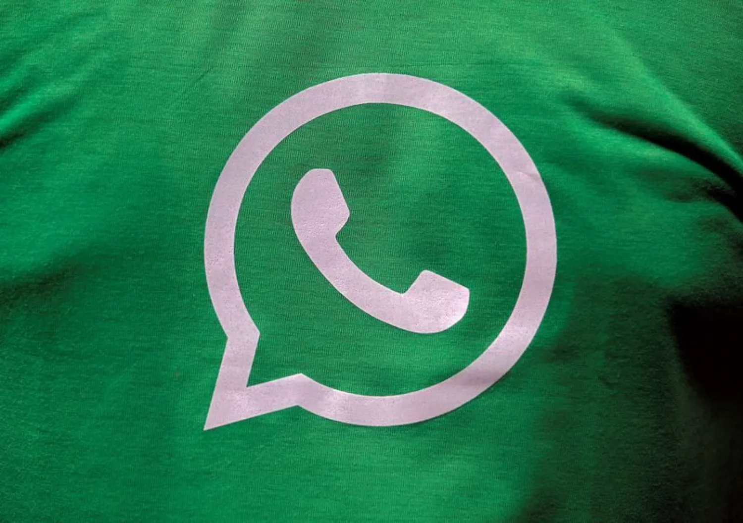FILE PHOTO: A logo of WhatsApp is pictured on a T-shirt worn by a WhatsApp-Reliance Jio representative during a drive by the two companies to educate users, on the outskirts of Kolkata, India, October 9, 2018. REUTERS/Rupak De Chowdhuri
