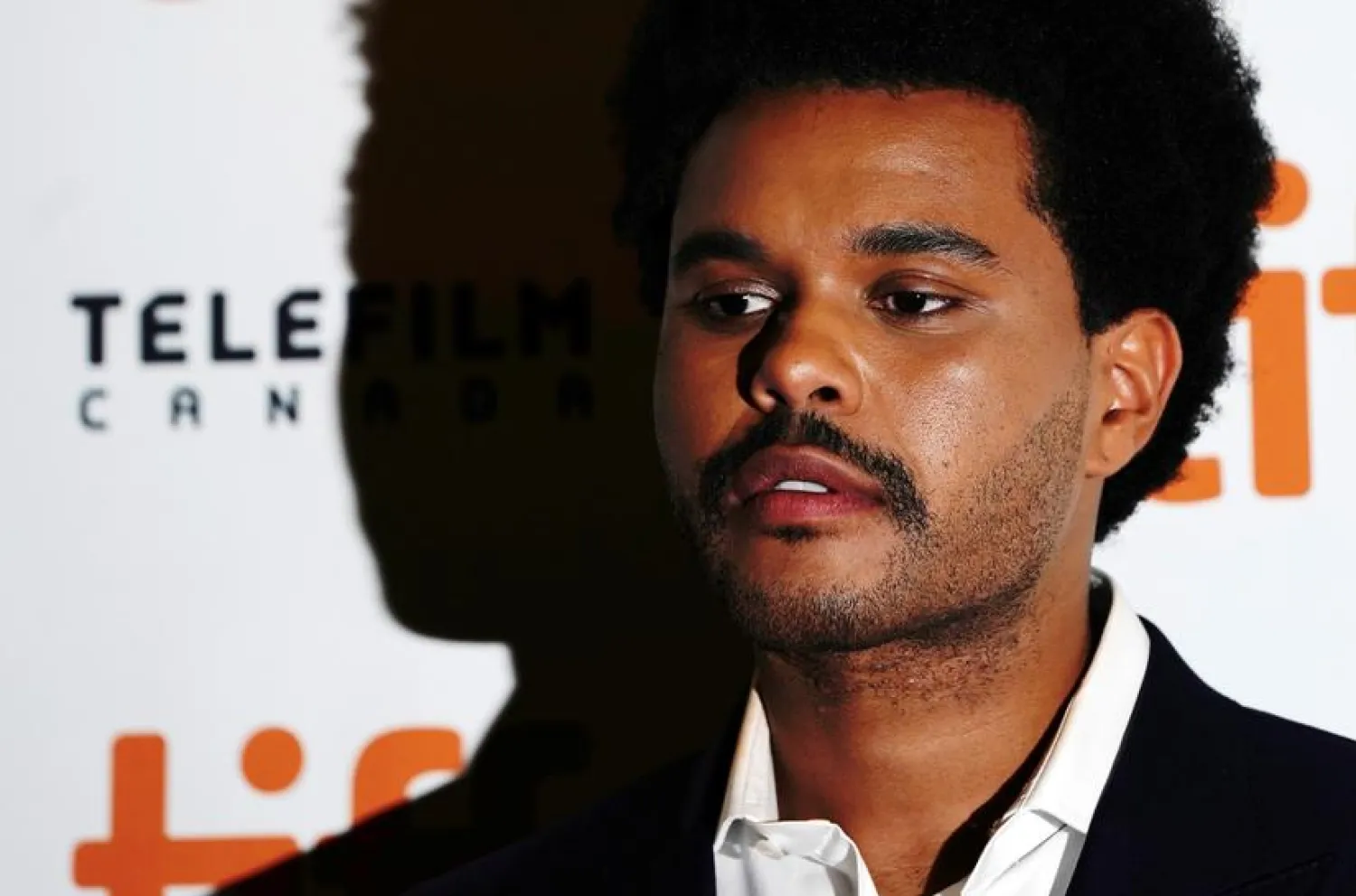 FILE PHOTO: Abel Makkonen Tesfaye, known as The Weeknd, arrives at the international premiere of "Uncut Gems" at the Toronto International Film Festival (TIFF) in Toronto, Ontario, Canada September 9, 2019. REUTERS/Mark Blinch