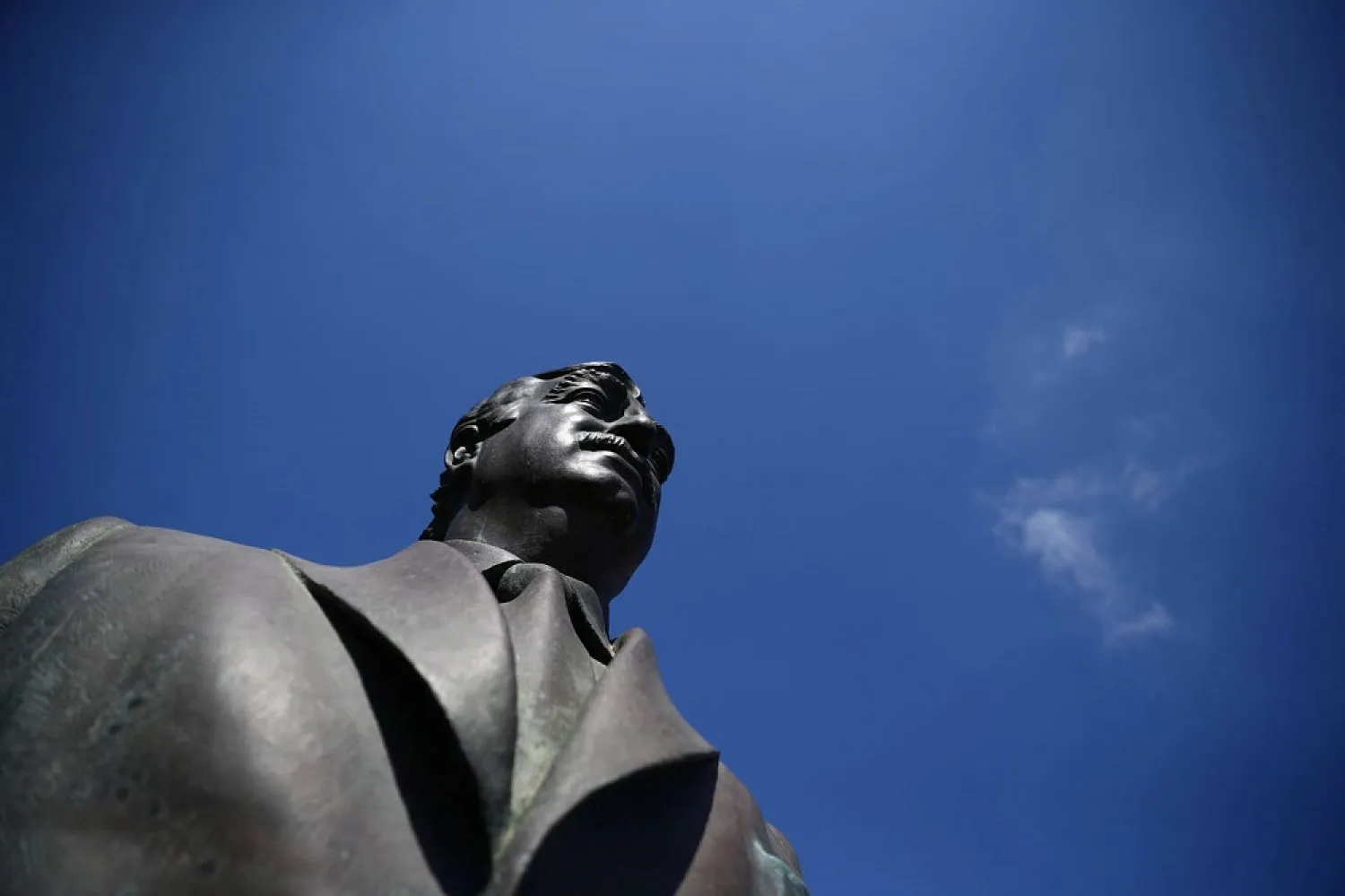 A statue of Lebanon's assassinated former PM Rafik Hariri is seen near the site of the suicide truck bombing that killed him in 2005, in Beirut, Lebanon, August 18, 2020. (Reuters)