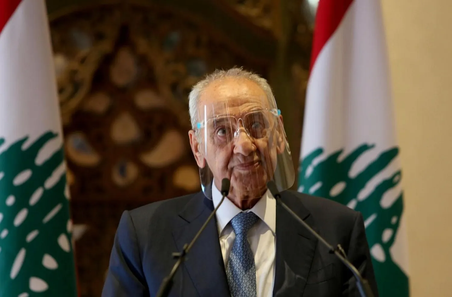 Lebanon's parliament speaker Nabih Berri wears a face shield during a news conference in Beirut, Lebanon October 1, 2020. (Reuters)