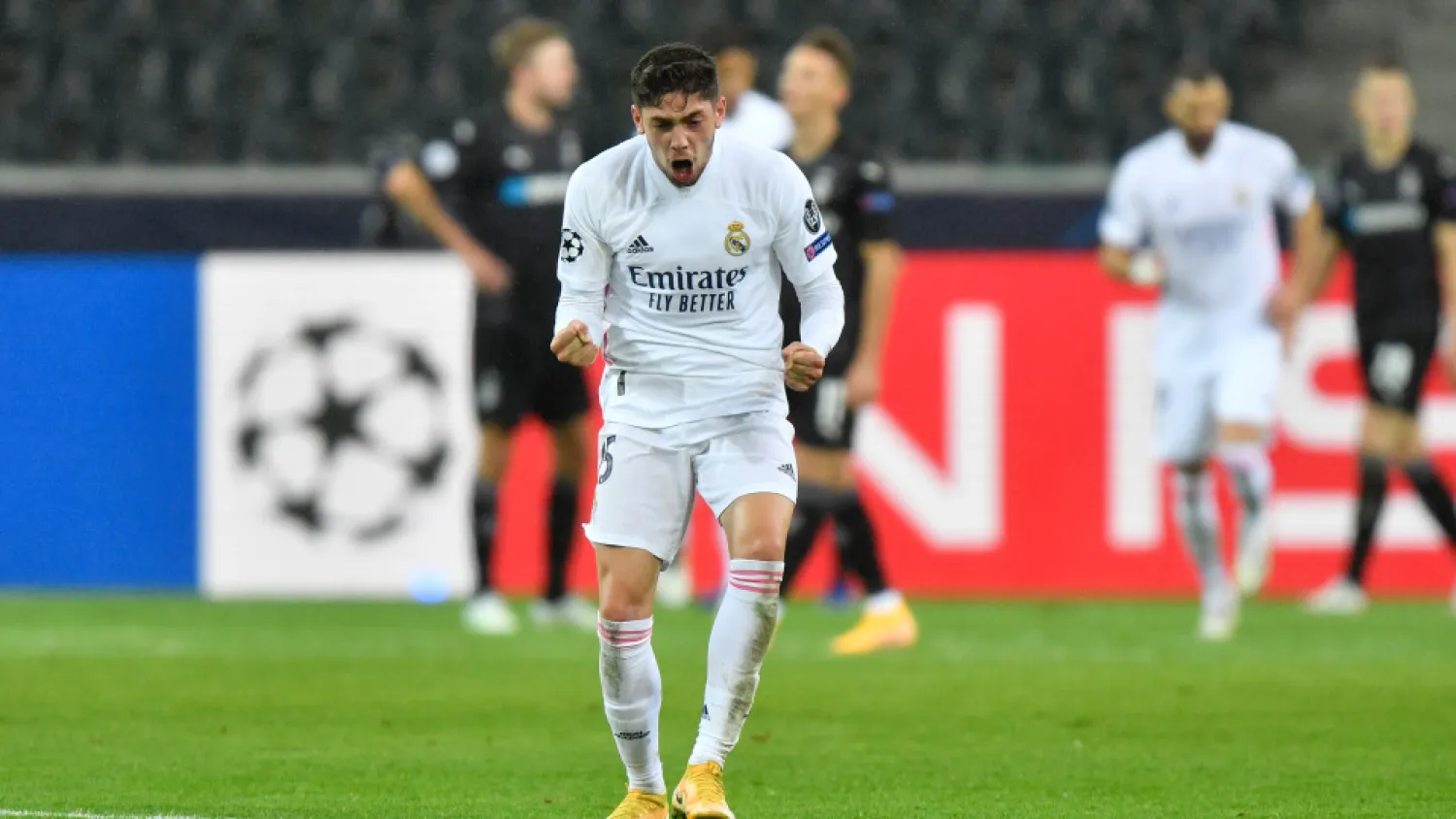 Real Madrid’s Federico Valverde celebrates after Casemiro scored his side’s second goal against Borussia Moenchengladbach at the Borussia Park in Moenchengladbach, Germany, Oct. 27, 2020. (AP)