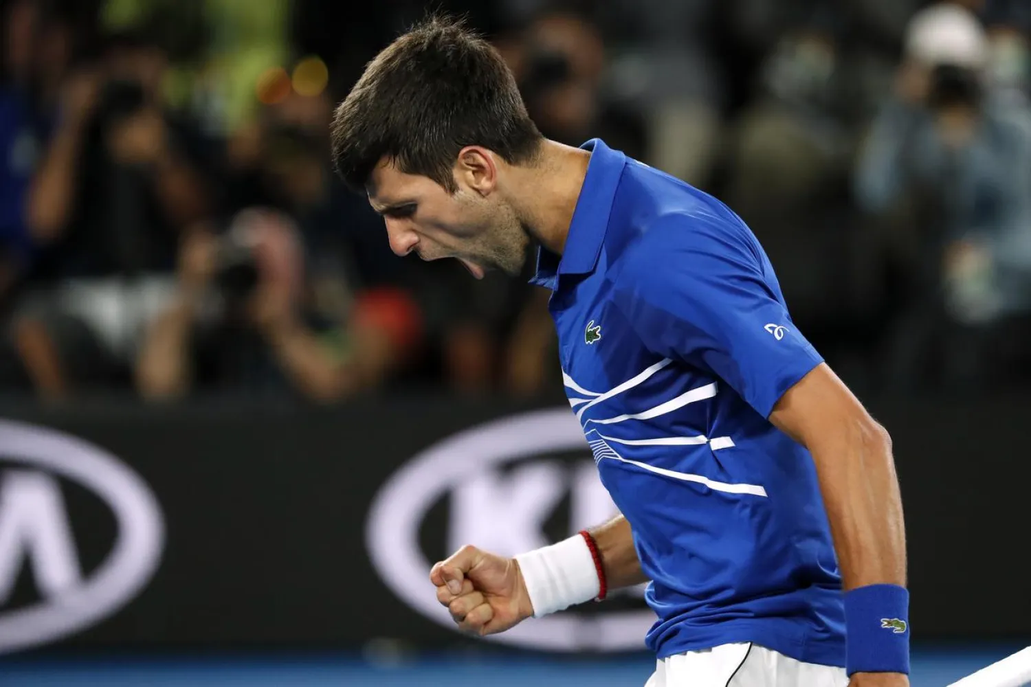Tennis - Australian Open - Men's Singles Final - Melbourne Park, Melbourne, Australia, January 27, 2019. Serbia's Novak Djokovic reacts during his match against Spain's Rafael Nadal. REUTERS/Kim Kyung-Hoon