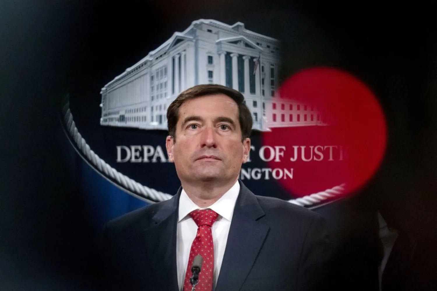 In this Oct. 19, 2020 file photo, Assistant Attorney General for the National Security Division John Demers takes a question from a reporter via teleconference at a news conference at the Department of Justice in Washington. (AP Photo/Andrew Harnik, pool)
