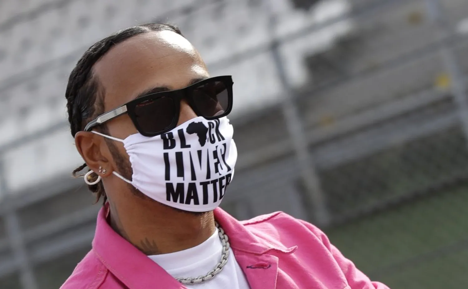 Lewis Hamilton wears a protective face mask during track inspection ahead of the Emilia Romagna F1 Grand Prix, at the Dino and Enzo Ferrari racetrack, in Imola, Italy, Oct. 30, 2020. (AP)