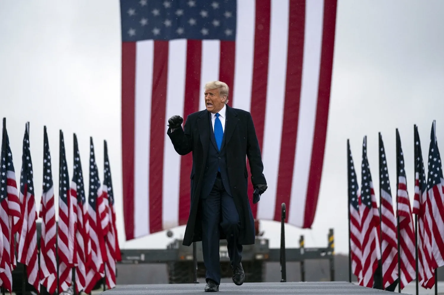 President Donald Trump arrives at Capital Region International Airport for a campaign rally, Oct. 27, 2020, in Lansing, Mich. (AP)