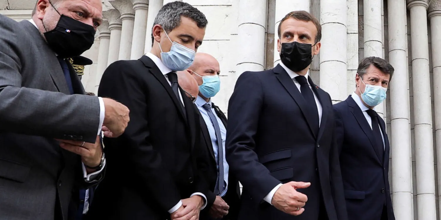 President Emmanuel Macron (right) and Interior Minister Gerald Darmanin in Nice, October 29, 2020. (AFP)